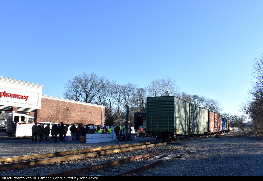 Broken up consist of the Susie Q TFT Train sits next to the CVS 